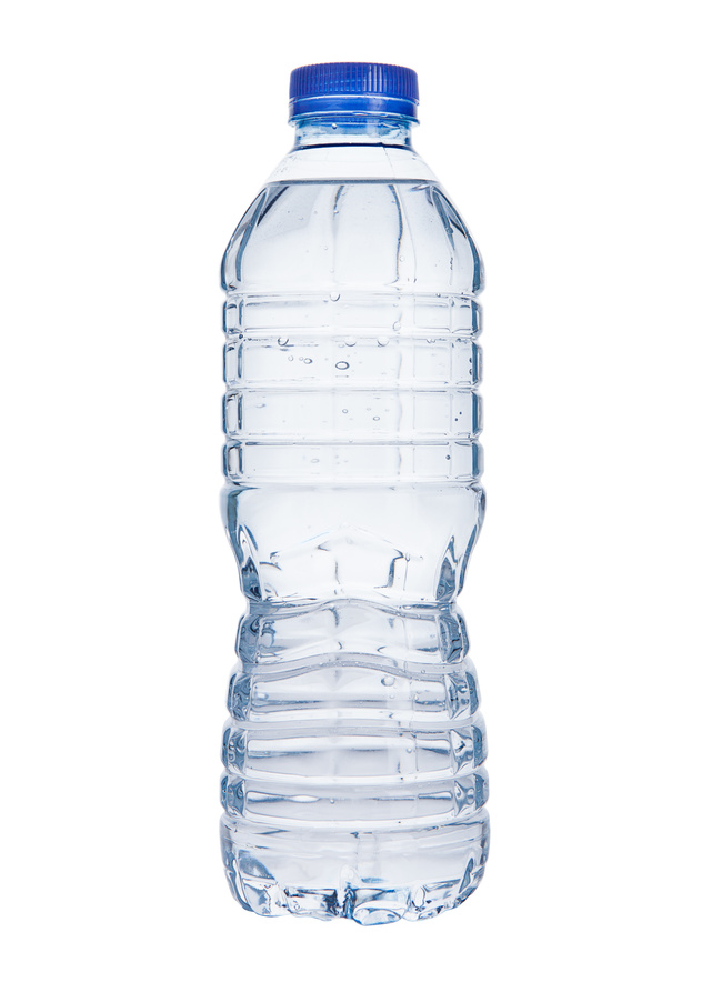 Plastic still mineral water bottle on white